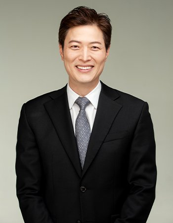 Headshot of Brian Lee, DDS, MADIA, FICOI