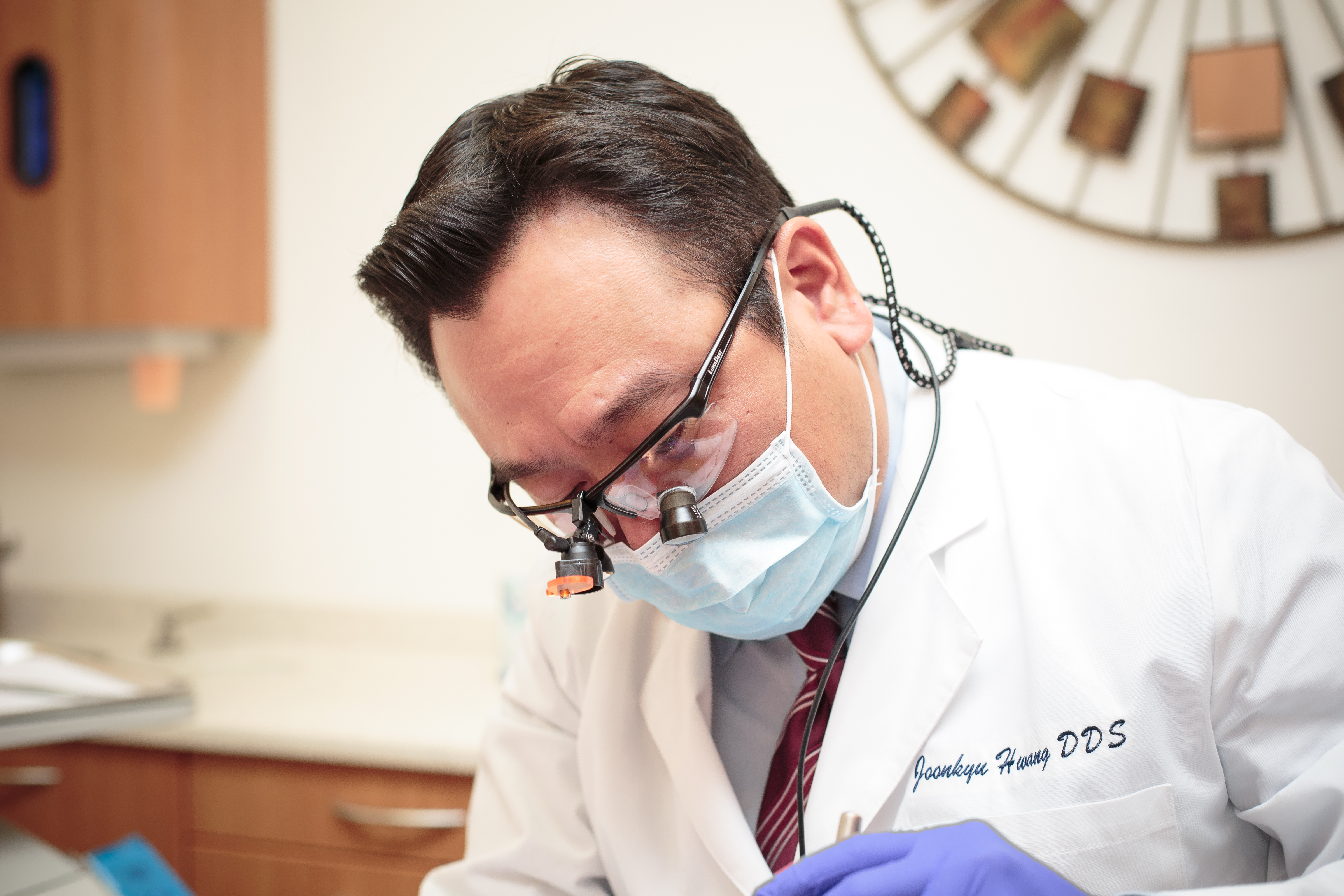 Dentist treating patient