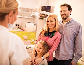 Smiling couple at dentist's office