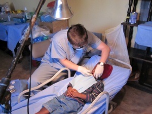 Dr. treating young boy