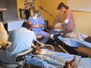 Dentist treating patients