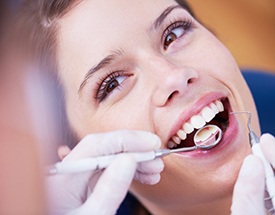 Woman receiving dental x-rays