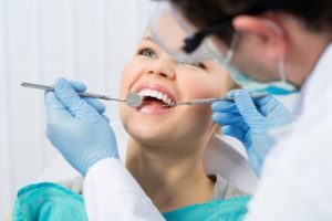 Woman getting a dental exam