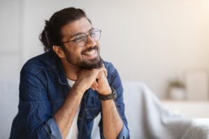 Man with braces smiling